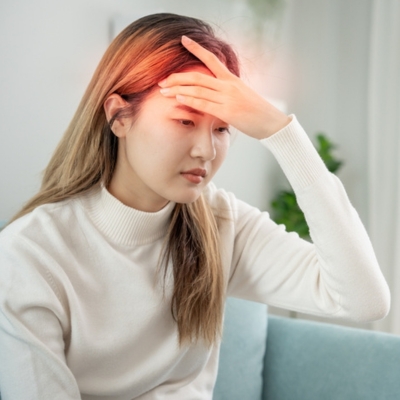 A chiropractor provides chiropractic treatment to relieve a patient’s chronic headaches through gentle spinal adjustments and posture correction.